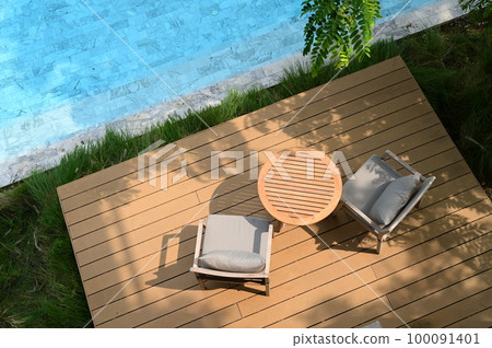 chair and deck on veranda, pool view 100091401