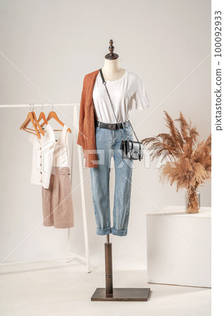 Vintage mannequin without hands on a light studio background Vintage mannequin without hands on a light studio background 100092933