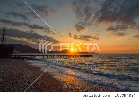 Colorful sunrise at sea 100094884