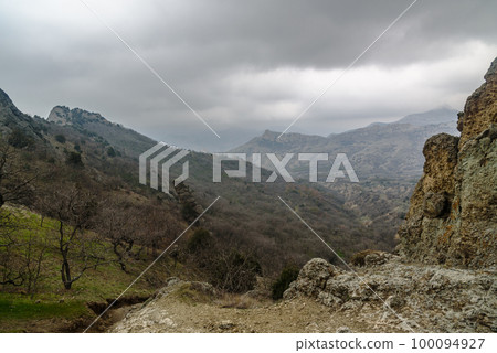 Landscape of Karadag Reserve in spring. View of mountains, rocks and ridge. Crimea Landscape of Karadag Reserve in spring. View of mountains, rocks and ridge. Crimea 100094927