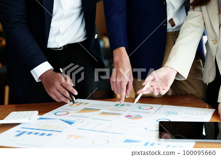 business group people meeting and discuss, plan financial budgets for investments, planning new marketing strategies to fight with competitors. 100095660