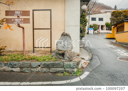 Dosojin standing at the intersection of Asama Onsen [Matsumoto City] 100097207
