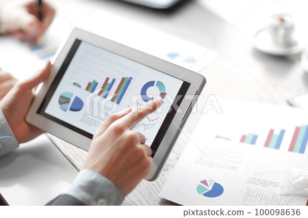 close up.financial report on the digital tablet screen. close up.financial report on the digital tablet screen. 100098636