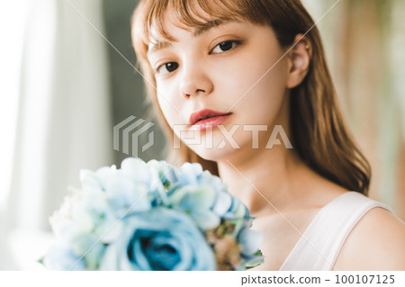 Beauty portrait of a beautiful female model Hydrangea Beauty portrait of a beautiful female model Hydrangea 100107125