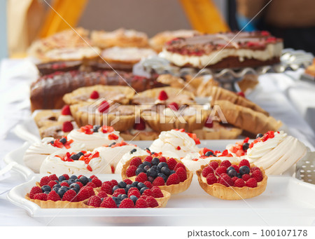Tasty desserts and delicacies at the confectionery stand at the farmers street food market in Prague Tasty desserts and delicacies at the confectionery stand at the farmers street food market in Prague 100107178