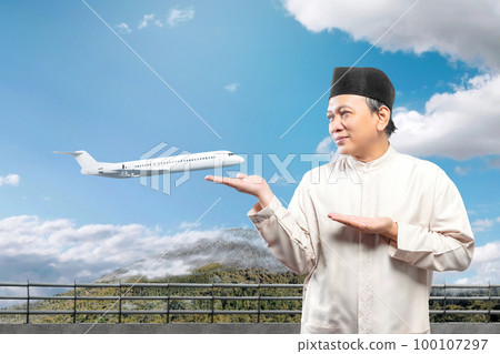 Asian Muslim man with open palm hand showing something 100107297