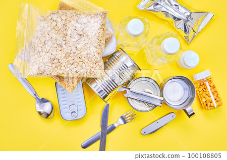 emergency food over yellow background 100108805
