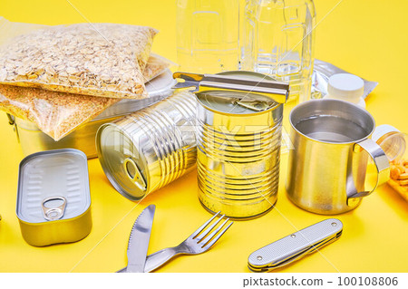 emergency food over yellow background 100108806