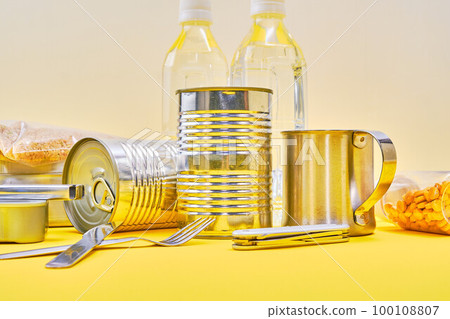 emergency food over yellow background 100108807