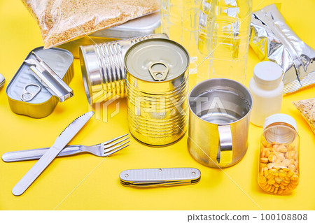 emergency food over yellow background 100108808