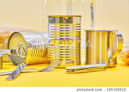 emergency food over yellow background 100108810
