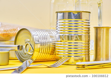 emergency food over yellow background 100108812