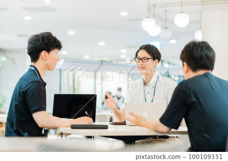 A businessman having a meeting in a sophisticated office A businessman having a meeting in a sophisticated office 100109331