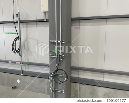 Wiring and piping arranged on steel columns 100109577