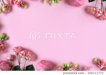Peonies, roses on pink background with copy space. Abstract natural floral frame layout with text space. Romantic feminine composition. Wedding invitation. International Women day, Mother Day concept 100111773