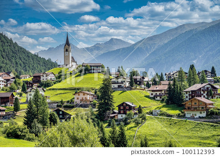 Beautiful Schmitten village at Albula pass in Grisons, Graubuenden, Switzerland 100112393
