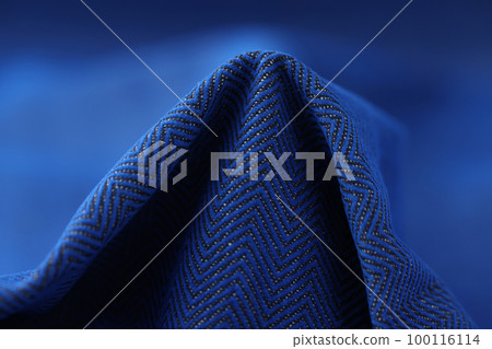 Element of blue fabric with zigzag pattern. 100116114