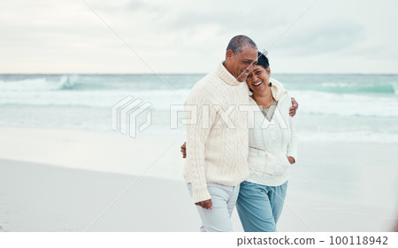 Senior couple, hug and beach walk together with funny moment, comic memory or conversation by sea. Happy retirement, ocean and outdoor embrace with love, bond or romance for laugh by waves on holiday Senior couple, hug and beach walk together with funny moment, comic memory or conversation by sea. Happy retirement, ocean and outdoor embrace with love, bond or romance for laugh by waves on holiday 100118942