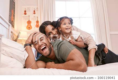 Theres no better bond than a family bond. Shot of a young family relaxing at home. Theres no better bond than a family bond. Shot of a young family relaxing at home. 100119041