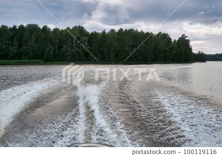 Trail from a speedboat on the water Trail from a speedboat on the water 100119116
