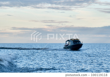 Dark speedboat goes on the water Dark speedboat goes on the water 100119118