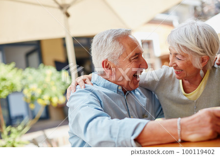 Who says fun is only for the young. Shot of a happy senior couple spending time together at a cafe. Who says fun is only for the young. Shot of a happy senior couple spending time together at a cafe. 100119402
