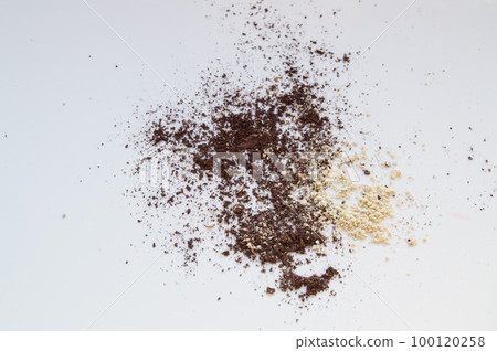 Brown and beige eye shadow scattered on white background, texture for makeup Brown and beige eye shadow scattered on white background, texture for makeup 100120258