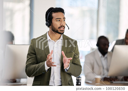 Call center, serious and consulting with man in office for customer support, telemarketing and advisory. Help desk, team leader and contact us with employee listening for communication, sales and crm Call center, serious and consulting with man in office for customer support, telemarketing and advisory. Help desk, team leader and contact us with employee listening for communication, sales and crm 100120830