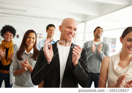All in a days work. Shot of a diverse group of colleagues in an office. 100120927
