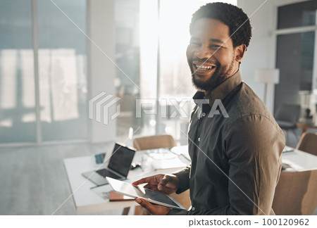 Business, portrait and smile of black man with tablet in office for research, internet browsing or web scrolling. Ceo, boss and happy male entrepreneur with technology laughing at meme in company. Business, portrait and smile of black man with tablet in office for research, internet browsing or web scrolling. Ceo, boss and happy male entrepreneur with technology laughing at meme in company. 100120962