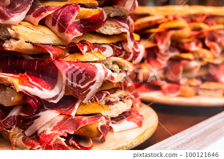 traditional spanish bocadillo with jamon iberico 100121646