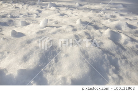 Snow texture, snowdrifts under sunlight with shadows Snow texture, snowdrifts under sunlight with shadows 100121908