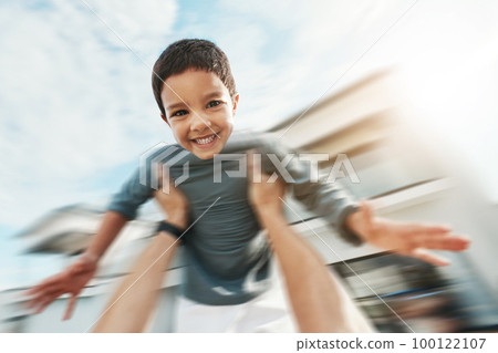 Family, speed and portrait of boy in air enjoying playing outdoors on holiday, vacation and weekend. Motion blur, childhood and happy face of boy in parents arms for bonding, quality time and relax 100122107