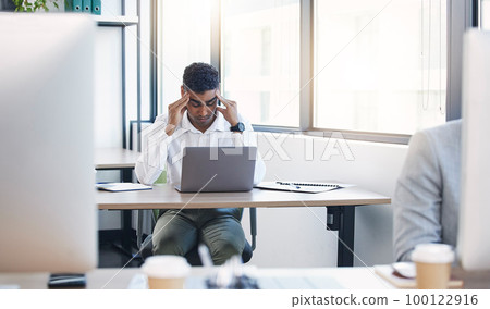 Businessman, stress headache and laptop in office with burnout, anxiety and tired at desk with deadline. Young executive, frustrated or stressed at table with pc, 404 glitch or exhausted at workplace Businessman, stress headache and laptop in office with burnout, anxiety and tired at desk with deadline. Young executive, frustrated or stressed at table with pc, 404 glitch or exhausted at workplace 100122916