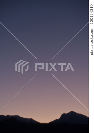 Venus and Jupiter shining above Mt. 100124310