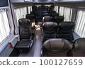 Comfortable interior of a passenger bus with soft seats 100127659