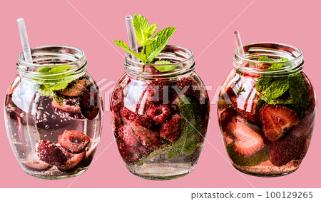 Healthy detox raw drink water with raspberry strawberry cherry on isolated background Healthy detox raw drink water with raspberry strawberry cherry on isolated background 100129265