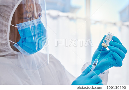 Covid or corona vaccine and injection by doctor or healthcare worker for health and wellness at hospital or clinic. Medical practitioner working with medicine to protect from pandemic virus infection 100130590