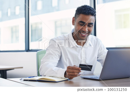 Internet payment, credit card and business man doing corporate banking budget work. Office, savings information and loan of a insurance agent employee working with company finance information Internet payment, credit card and business man doing corporate banking budget work. Office, savings information and loan of a insurance agent employee working with company finance information 100131250