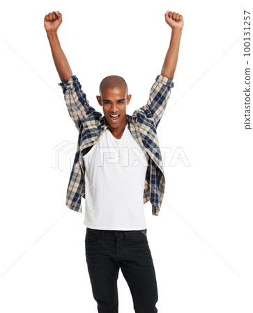 Winner, portrait and black man celebration of success, motivation and bonus deal on white background. Happy male model celebrate achievement, winning lotto competition and excited sale announcement 100131257