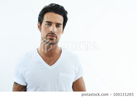 I make this shirt look good. Shot of handsome man wearing a white t-shirt. 100131265