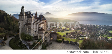 Most beautiful medieval castles of France - Menthon located near lake Annecy. aerial view 100131550