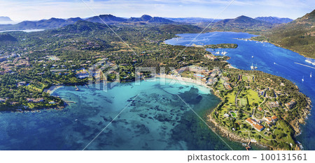 Italy summer holidyas . Sardegna island - stunning Emerald coast (costa smeralda) with  beautiful beaches. aerial view of Ira beach with turquoise sea 100131561