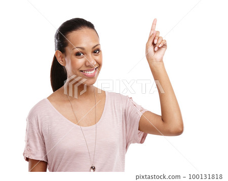 Black woman, happy portrait and pointing finger in studio for advertising mockup, marketing promo or sales product suggestion. Smile, point hands and vision motivation isolated in white background Black woman, happy portrait and pointing finger in studio for advertising mockup, marketing promo or sales product suggestion. Smile, point hands and vision motivation isolated in white background 100131818