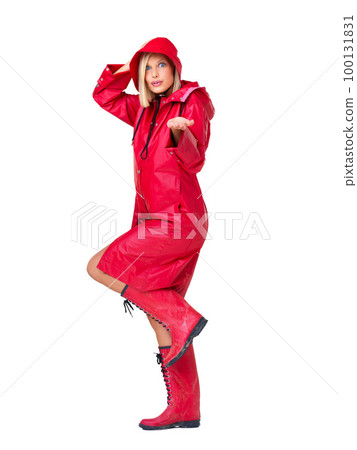 Winter, waterproof and portrait of a woman with a raincoat isolated on a white background in studio. Insurance, happy and model with clothes for rain, boots and prepared for bad weather on a backdrop Winter, waterproof and portrait of a woman with a raincoat isolated on a white background in studio. Insurance, happy and model with clothes for rain, boots and prepared for bad weather on a backdrop 100131831