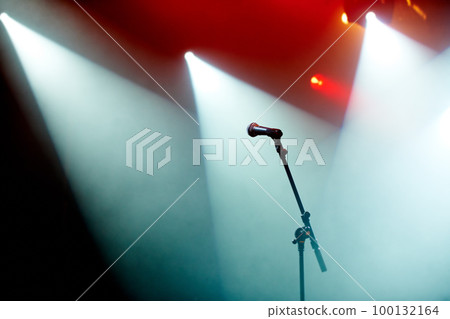 Ready for the concert. A microphone stand on an empty stage. 100132164