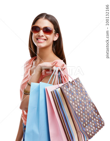 Woman with shopping bag, retail and fashion with shopping and sunglasses isolated on white background. Discount, sale and customer with paper bag, luxury designer brand and clothes with happy woman 100132166