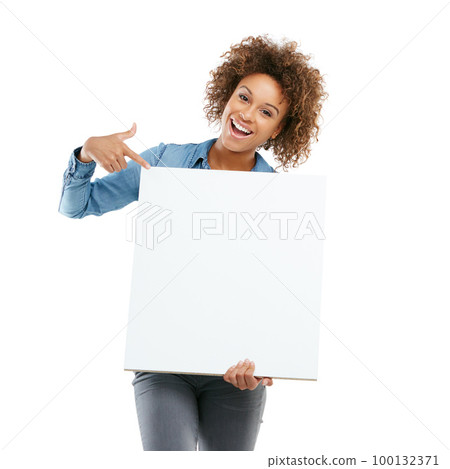 Yes Its finally here. Studio shot of an attractive young woman holding a placard. Yes Its finally here. Studio shot of an attractive young woman holding a placard. 100132371