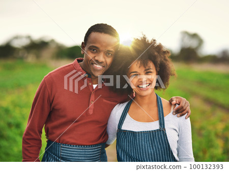 Our farm is thriving. Cropped portrait of an affectionate young couple standing on their farm. Our farm is thriving. Cropped portrait of an affectionate young couple standing on their farm. 100132393