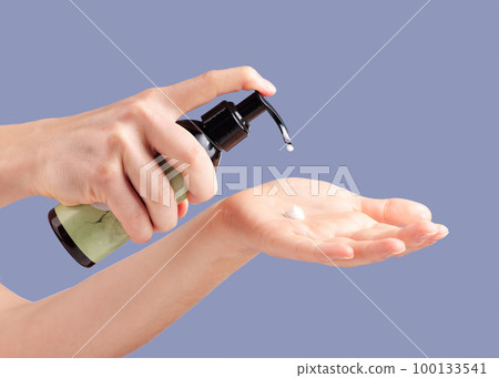 Moisturizer, skincare and hands with a bottle for cream isolated on a blue background in studio. Beauty, cosmetic and woman with lotion or sunscreen in palm for moisture, treatment and grooming Moisturizer, skincare and hands with a bottle for cream isolated on a blue background in studio. Beauty, cosmetic and woman with lotion or sunscreen in palm for moisture, treatment and grooming 100133541